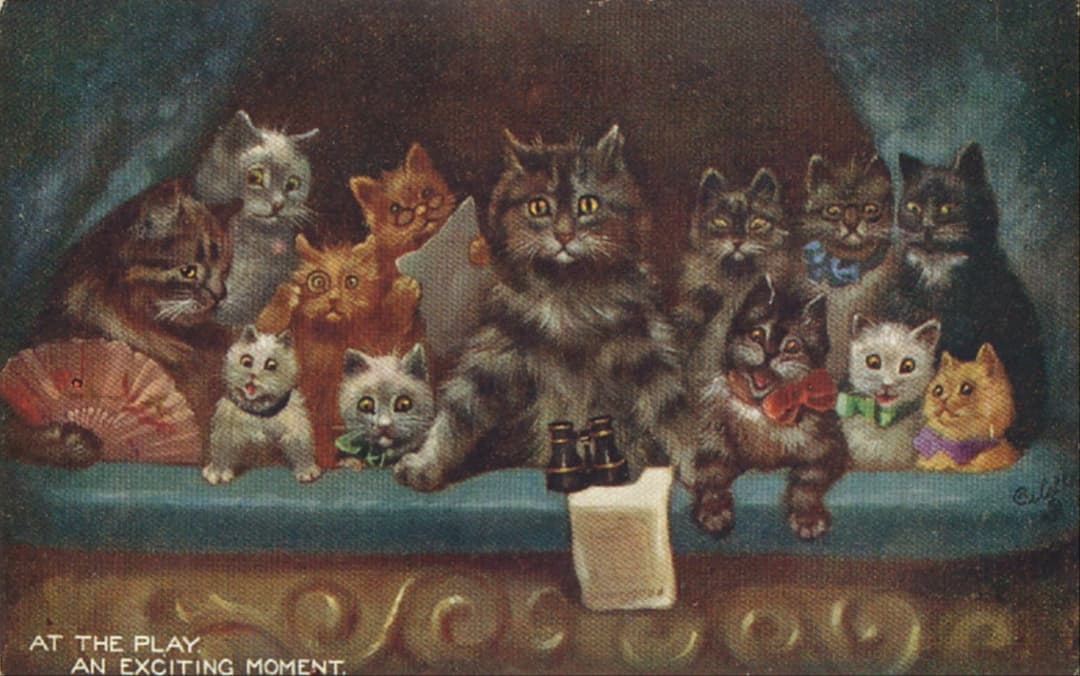 Louis Wain postcard of a theater box crowded with wide-eyed cats wearing bows, holding a fan and opera glasses